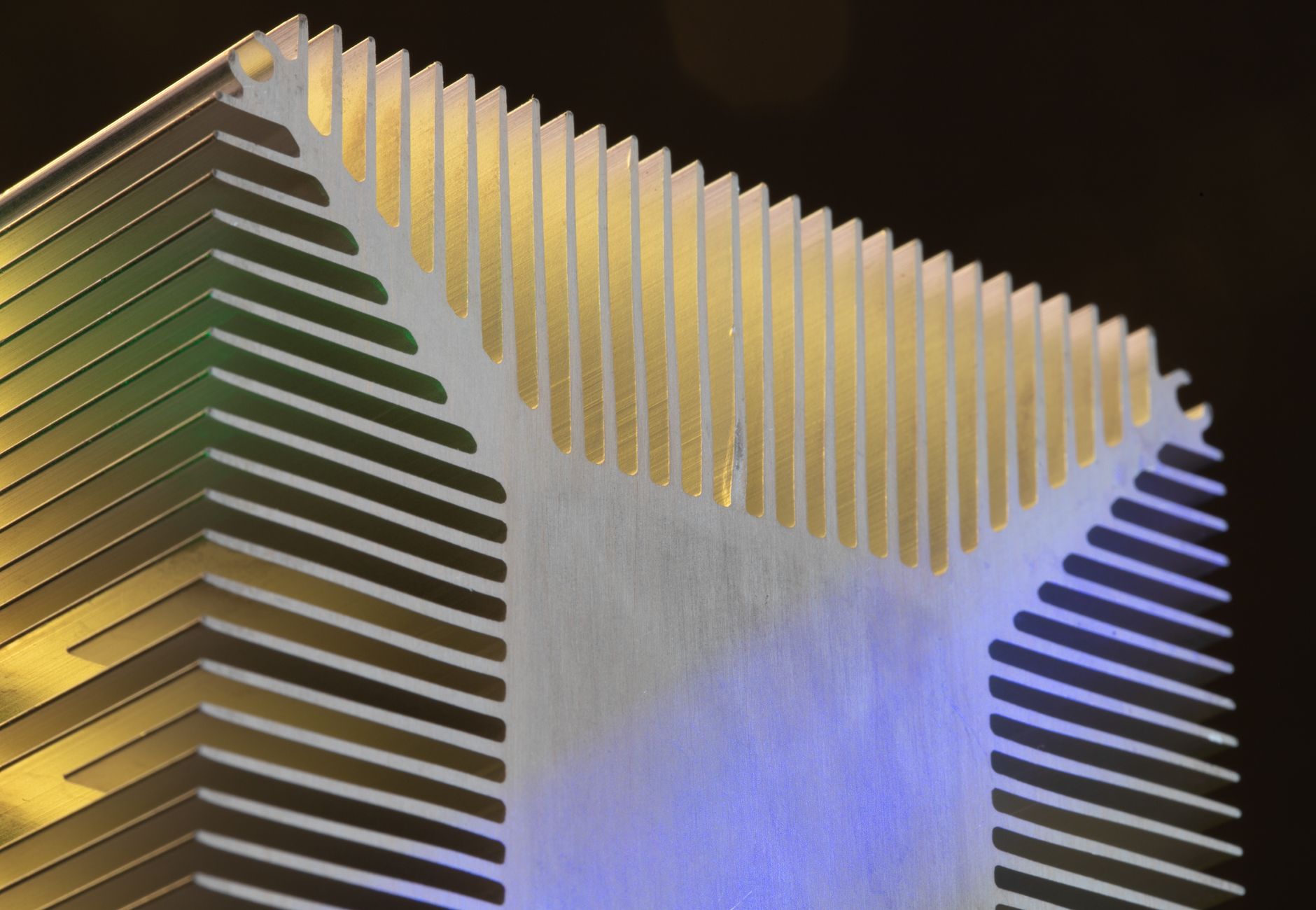 Detailed view of a metallic heat sink showcasing technological design.